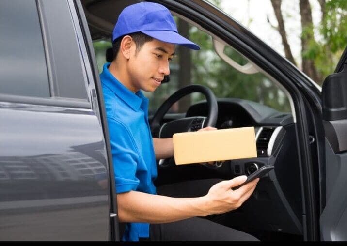 A field sales rep serving a shop from a cash van route